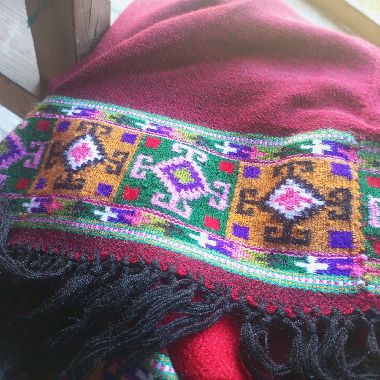 Hand-woven Kullu pattu shawl with traditional geometric border